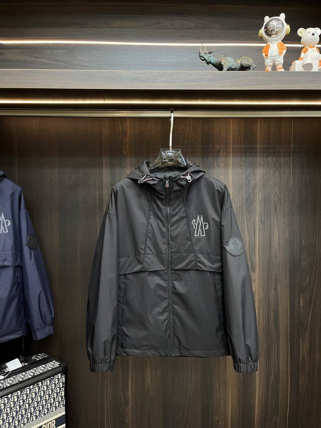 Featured: Moncler's new 2025 Spring/Summer hooded jacket featuring a scissors l