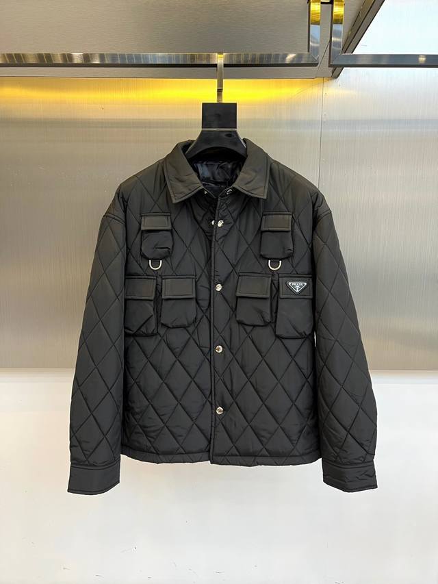 Prad, 25S's new fall/winter black diamond-quilted quilted jacket. Geometric orde