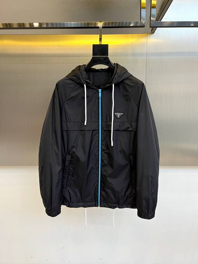 Prad, 25Fw black functional hooded jacket DDD. Matte nylon fabric creates lightw