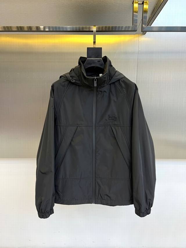 Bur 25S military-style hooded jacket, made of olive green matte nylon, with a st