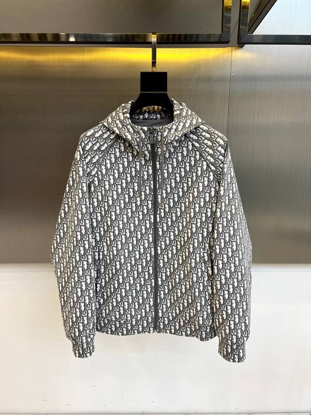 Dior features a pure white base with a classic gray monogram print. Made from 10