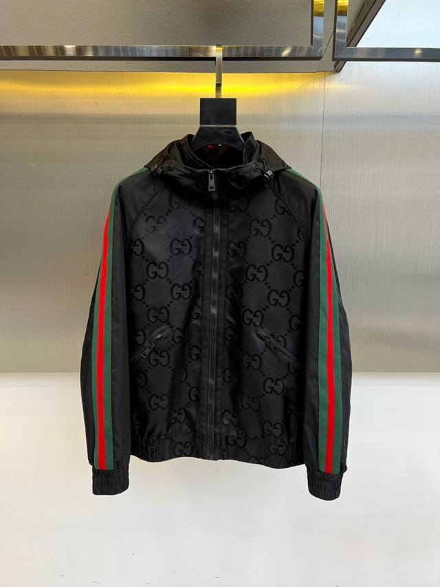 Gucci's new nylon waterproof hooded jacket for early fall 25 is a bold outdoor j
