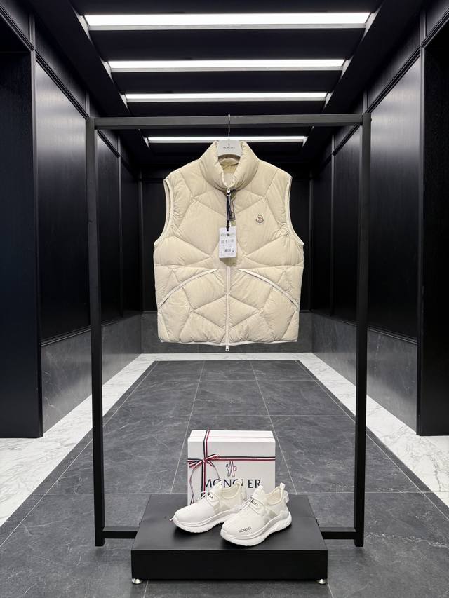 Premium down Moncler Vendavel men's cropped down vest. Filled with premium 95% E
