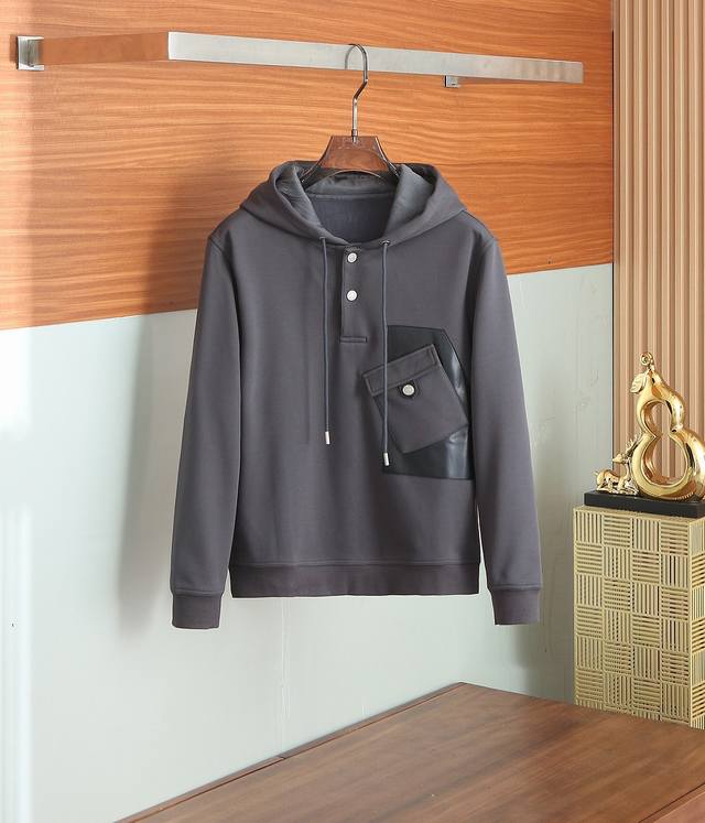 Herm*S 2025 Fall/Winter Empreintes Sellier Cuir two-button hooded sweatshirt. Al