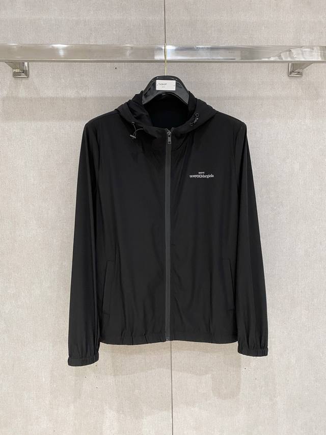 Margiela's new Spring/Summer 2025 men's sun-protective jacket features a uniquel