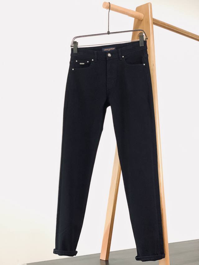 Louisvuitton's new jeans for Pre-Fall 2025 are crafted from a deep denim blue, b