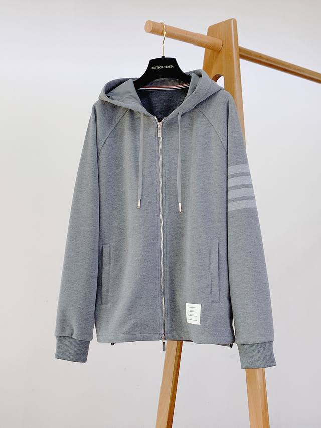 Thom Browne's new zip-up hooded blend jacket for Fall/Winter 2025 is a new arriv