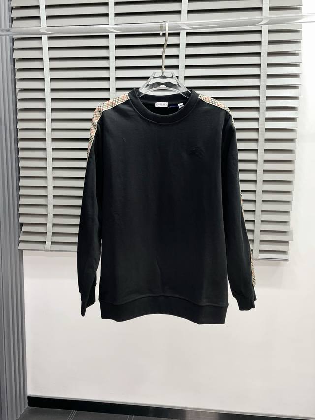 Sweatshirt and trousers. Exclusively available from Burberry, this new Burberry