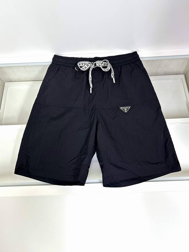 Prada's latest elasticated casual sports shorts. Made of fabric that's soft, lig