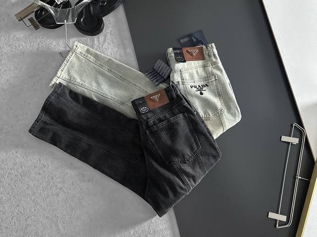 Prada's loose straight-leg vintage gradient jeans are a must-have for street sty