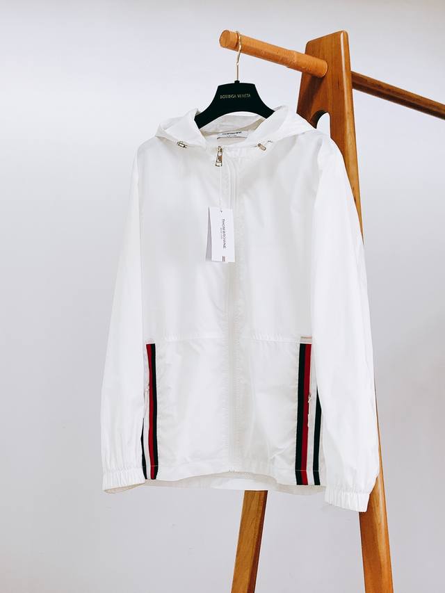 Thom Browne hooded jacket DDD. A premium brand, this relaxed-fit, regular-cut ja