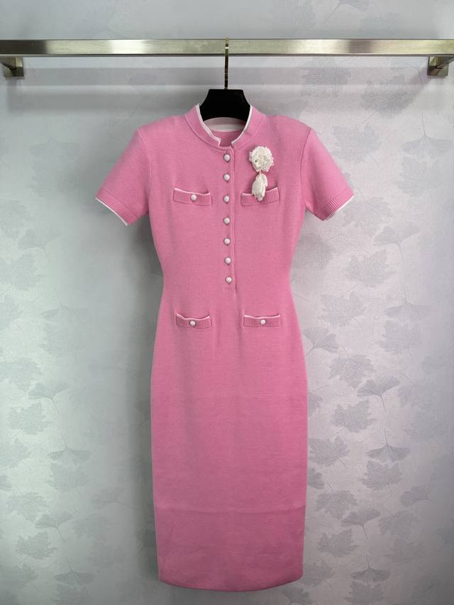 Se*25 New early fall pink knit dress with crocheted flower decoration. The fabri