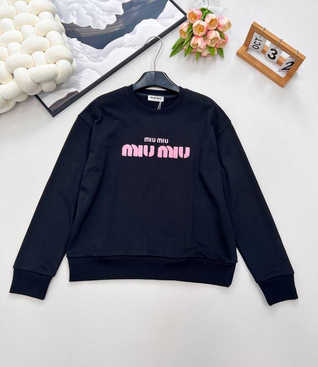 Miu Miu's new autumn/winter pink towel-embroidered terry cotton sweatshirt is a