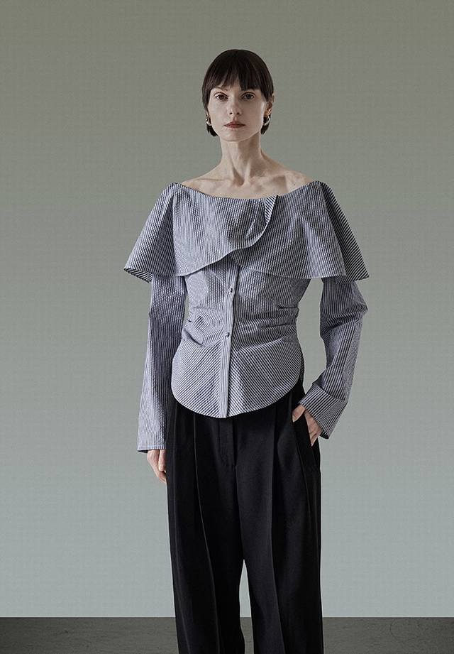 High-end temperament one-shoulder lace striped shirt with elegant attributes. Th