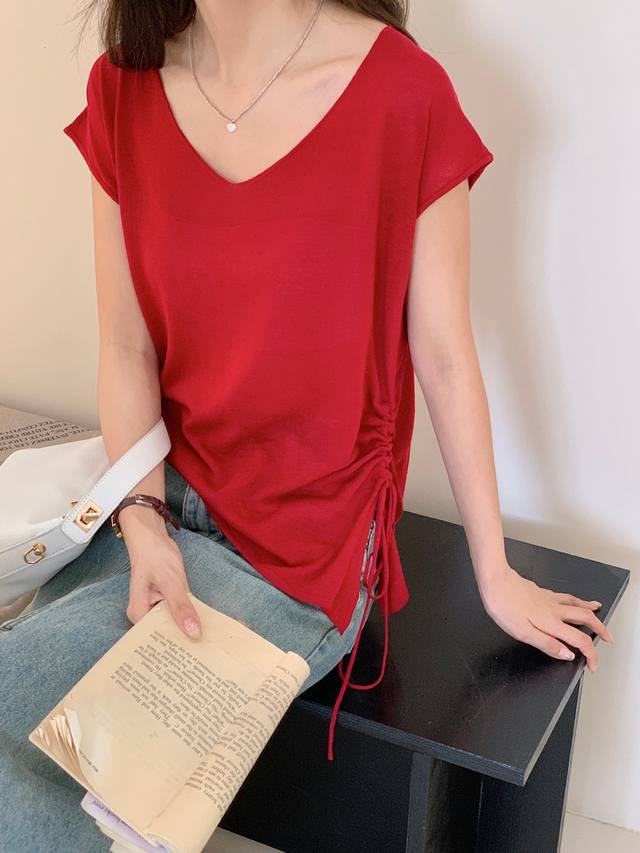 French side drawstring sweater with hollow back design Ingredients: 53.9% acryl