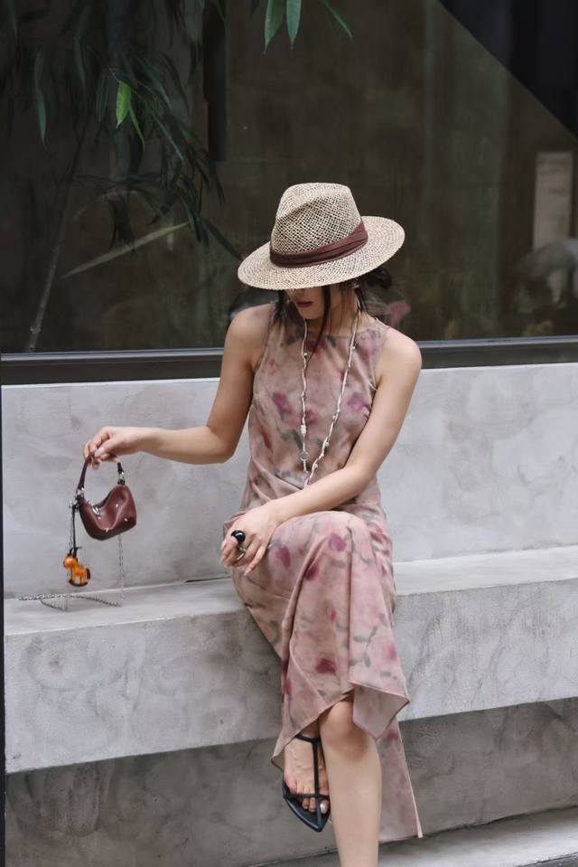 This exclusive, original, and highly popular silk bias-cut dress features a sof