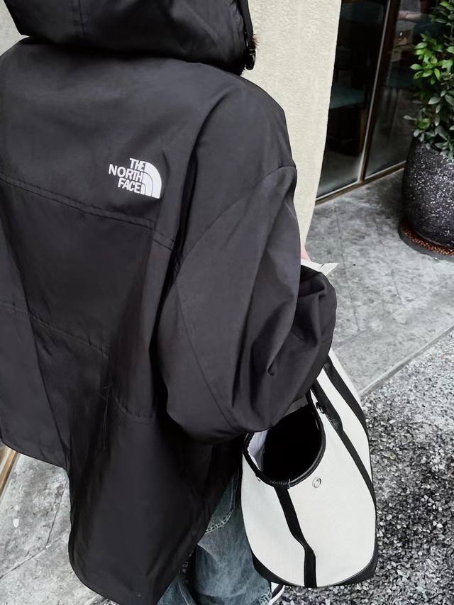 The North Face* The North Face's new zippered hooded jacket with a stand-up coll