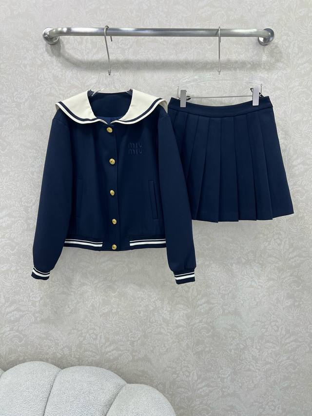 Miumi*25's new navy-inspired jacket and skirt combo. This cape-zippered jacket i