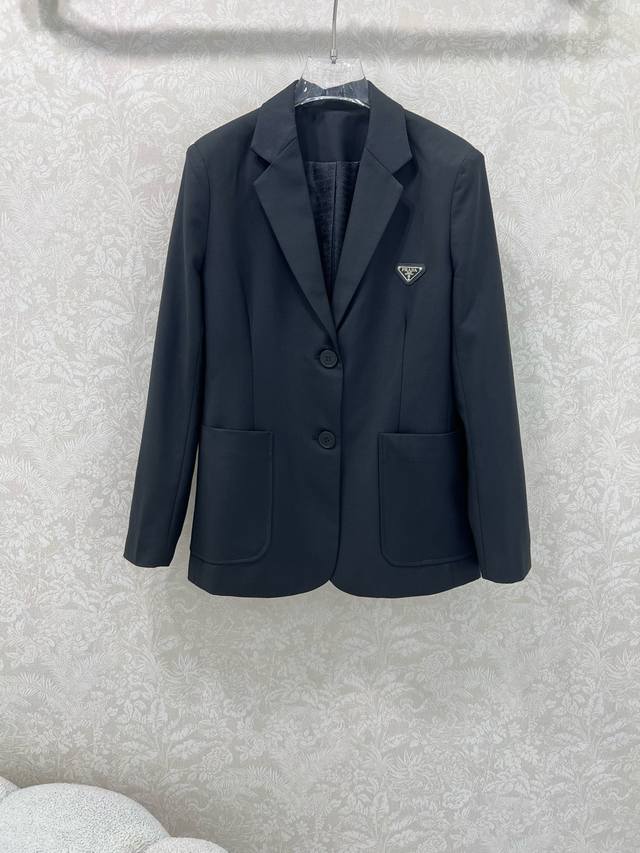 Prad*25 new blazer. The fabric is incredibly stiff and textured. The lining is a
