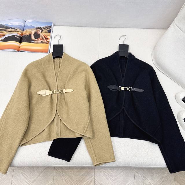 A hot seller, the L-brand 25Ss, the latest early fall cape with a leather butto