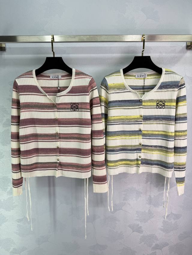 Loe*25's new early fall striped knit cardigan features a contrasting red, white,