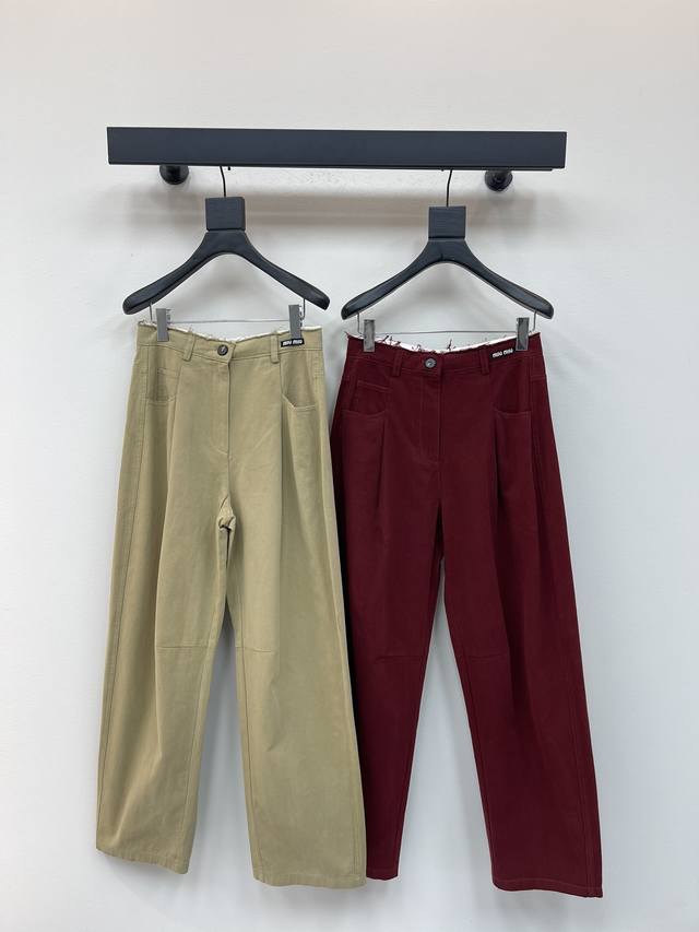 Miumi*25 Early Fall new release, raw-edge high-waisted scimitar trousers. Made f