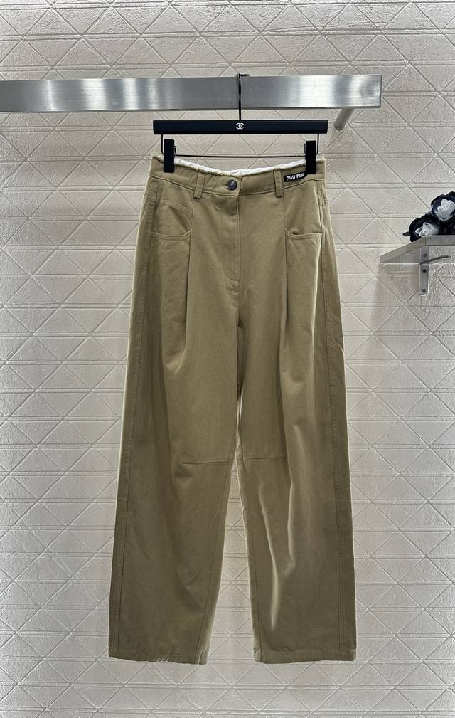 Miumi* 2025 New Arrival: High-Rise Scimitar Trousers. Made from custom Yb cotton