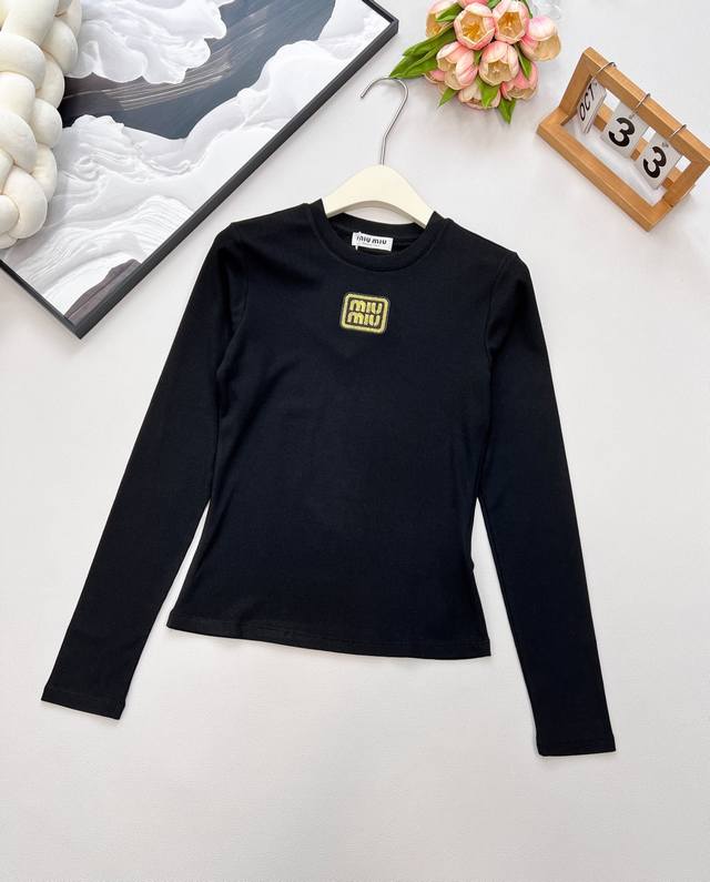 Miumiu's new gold-embroidered logo and threaded elastic slim-fit long-sleeved T-