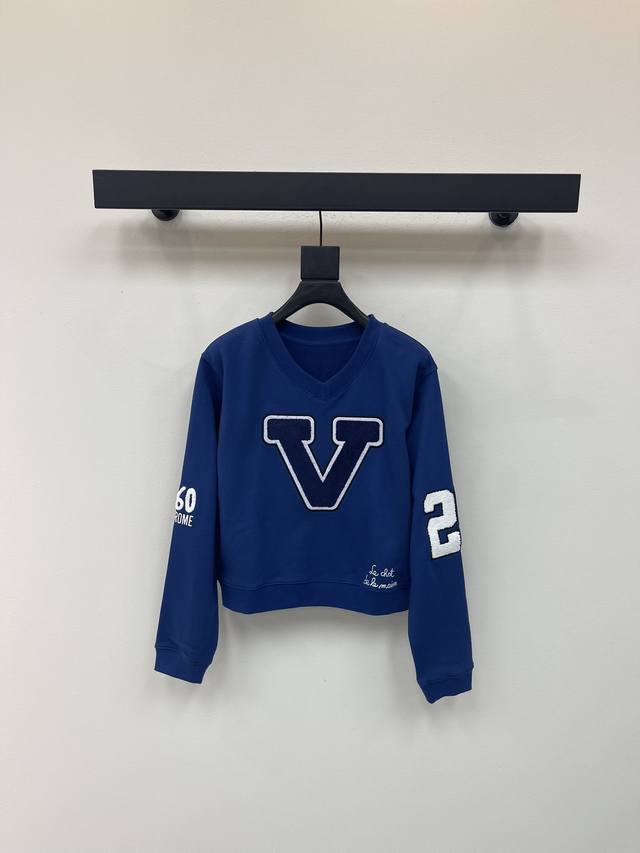 Valentin*25's new early fall cropped V-neck sweatshirt with heavy-duty cat head