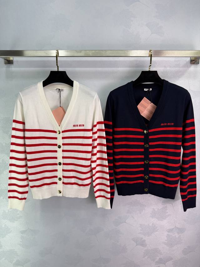 Miumi*25's new V-neck knitted cardigan features a custom logo embroidered on the