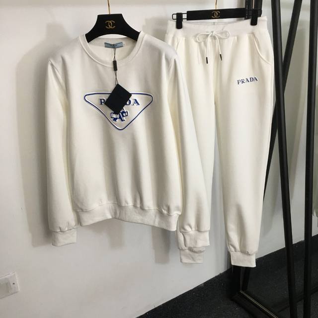 Style No. 9741 Prad* new sports suit, triangular letter three-dimensional logo