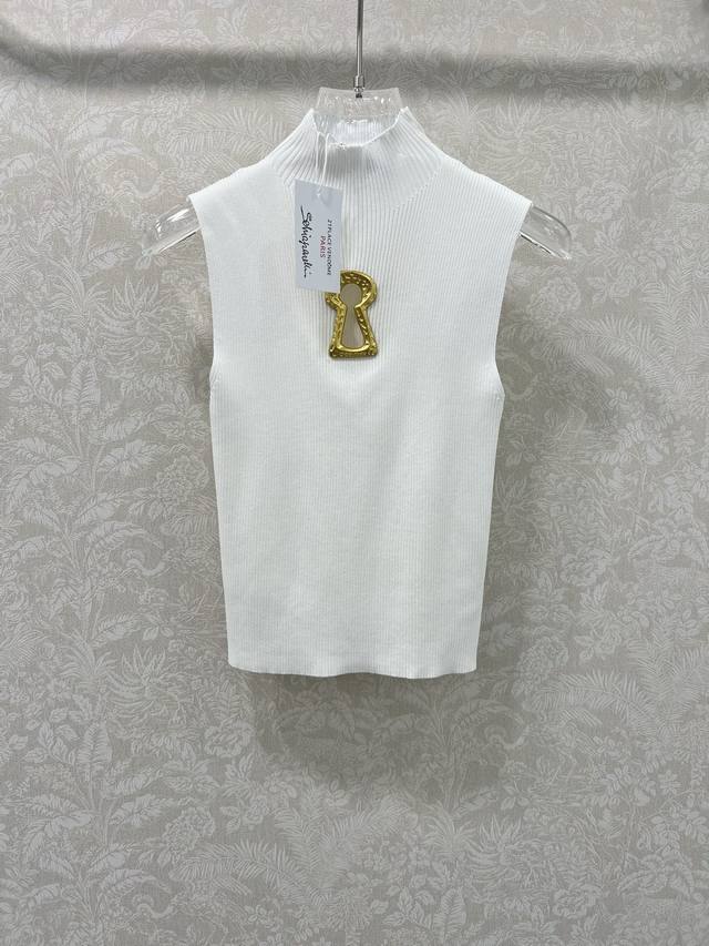 Sch* A French brand's 25th-century sleeveless knit top embellished with a gold k