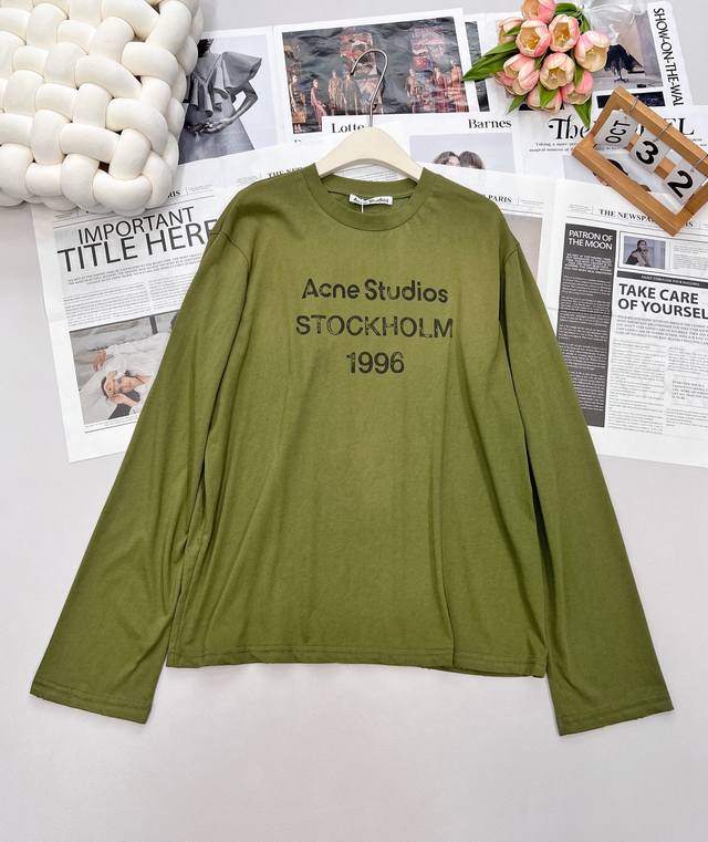 The Spring/Summer Acne distressed lettered long-sleeved T-shirt is back in stock