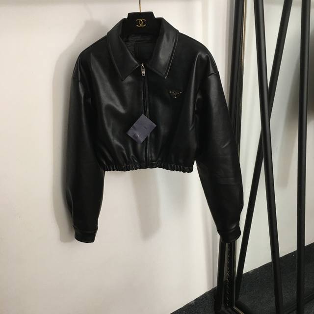 Style No. 6587 Prad* new style short long-sleeved Pu leather jacket with a tria