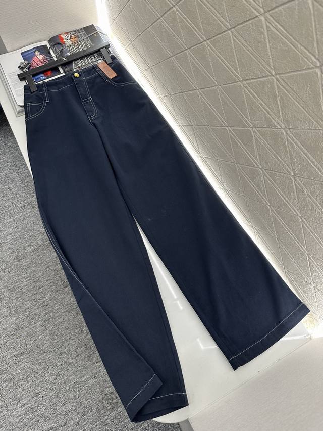 Loew* 2025 new arrival: wide-leg jeans with leather label. Made of custom Yb twi