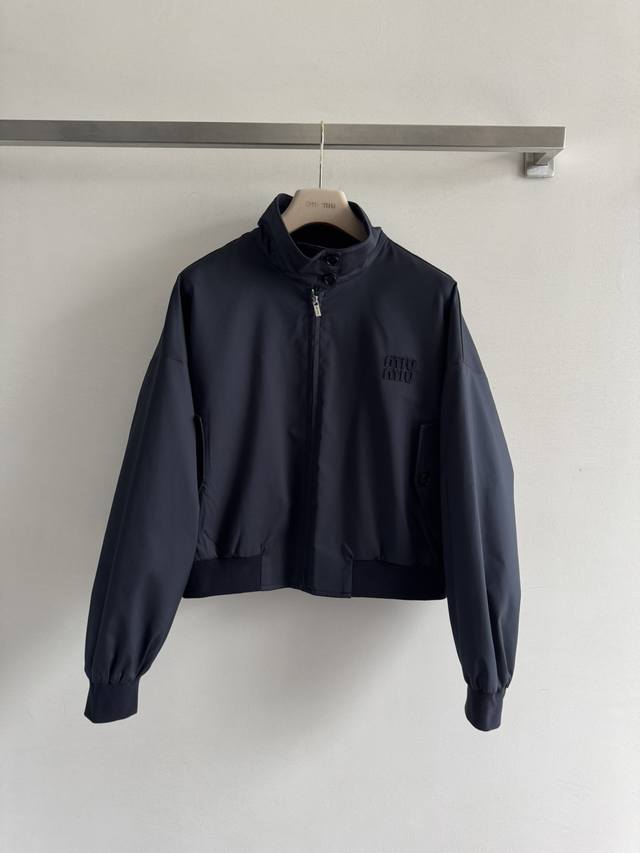 Miumi* 25's new early fall stand-up collar zipper jacket is just the right lengt