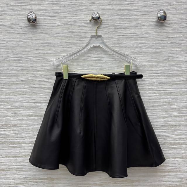 Sch's 25 new high-waisted umbrella-shaped wool skirt is custom-made with 100% im