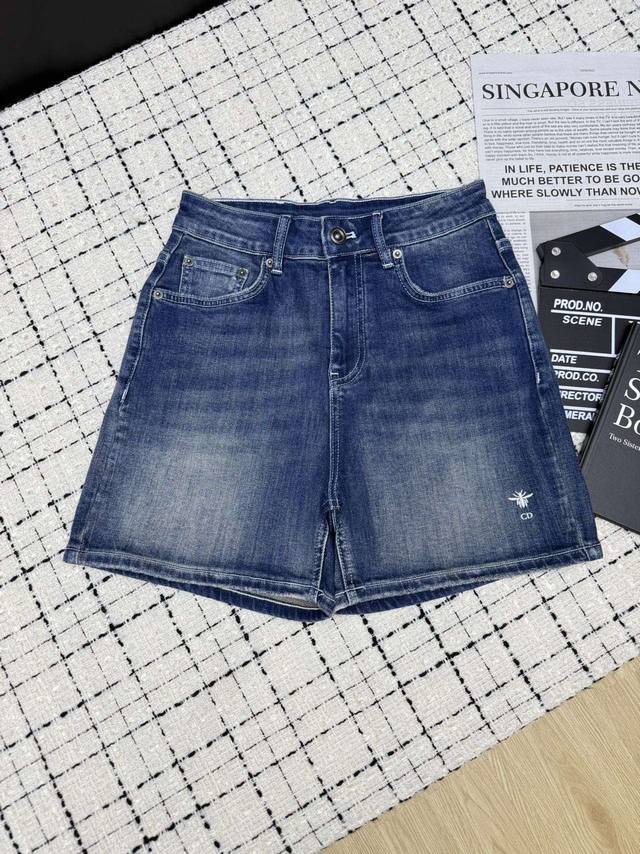 Dio*25Ss Embroidered Logo Denim Shorts. These stylish shorts feature a butterfly