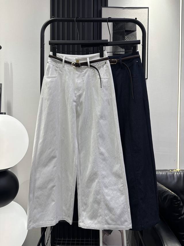 Mm6- New washed Tencel denim wide-leg pants with a thin leather belt. The shape
