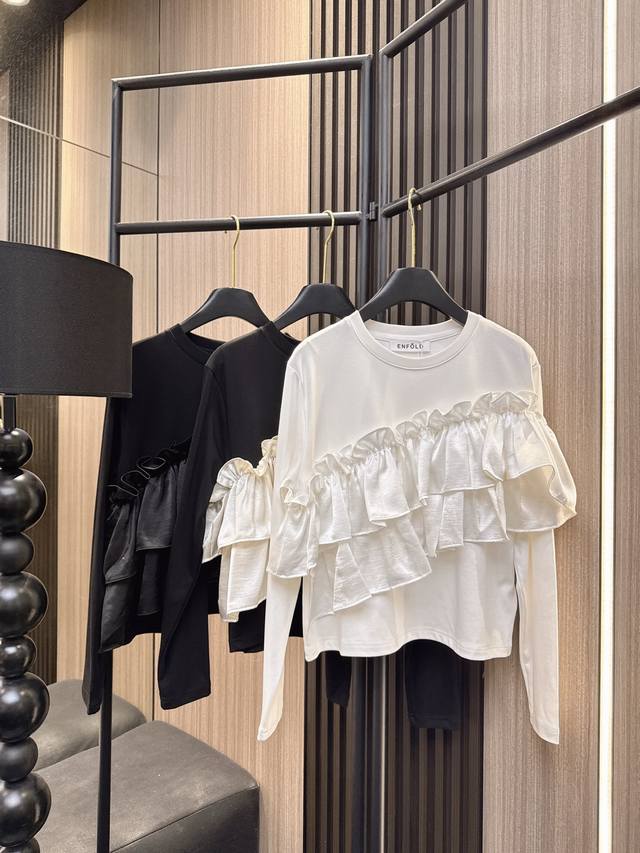 Enfold's new Fall/Winter 2025 collection features a long-sleeved pullover top wi