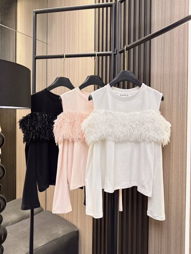 Enfold's new 2025 Fall collection features a feather-stitched, off-the-shoulder