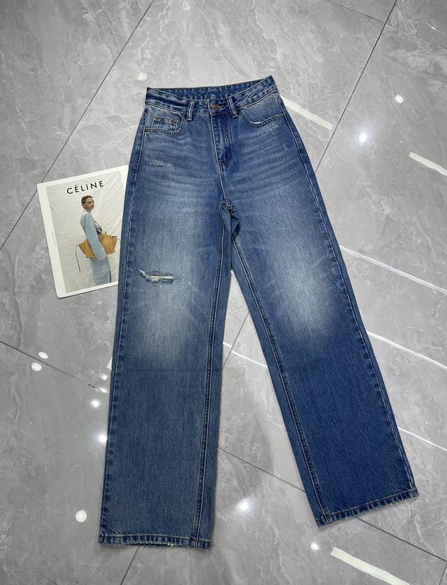 Details and photos of Cel In*'s new distressed straight-leg jeans. straight-leg