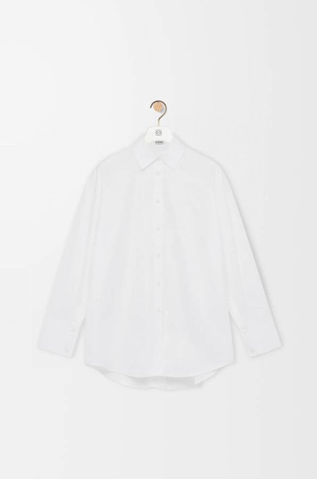 Loew's newest custom-made logo button-down shirt with embroidered logo on the ch