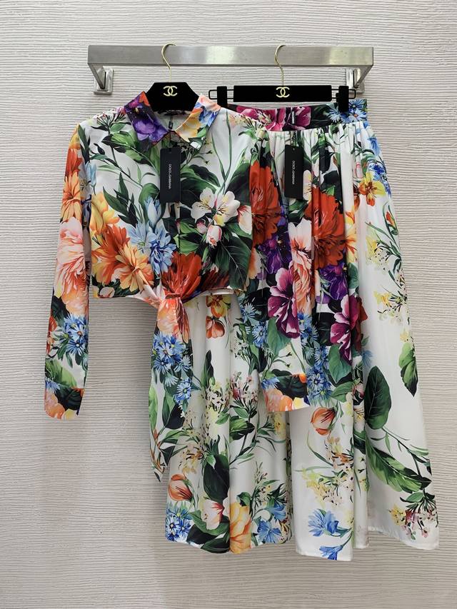Dolce & Gabbana's new colorful floral print two-piece set! It features a button-
