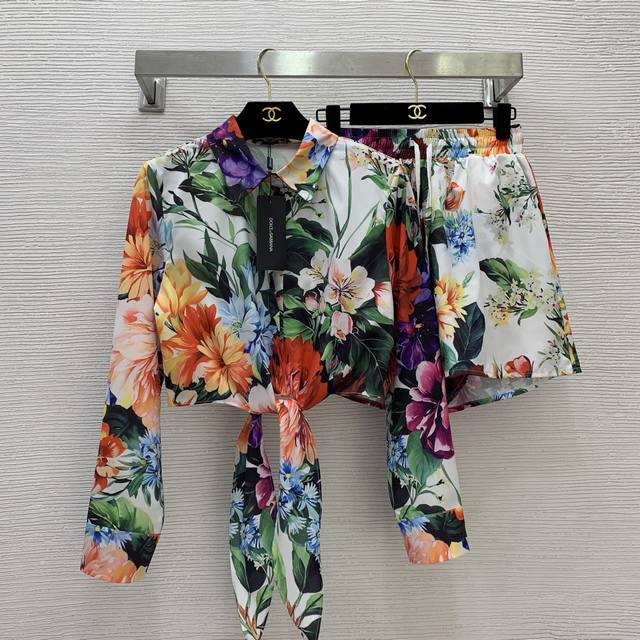 Dolce & Gabbana's latest colorful floral print two-piece suit! Button-down colla