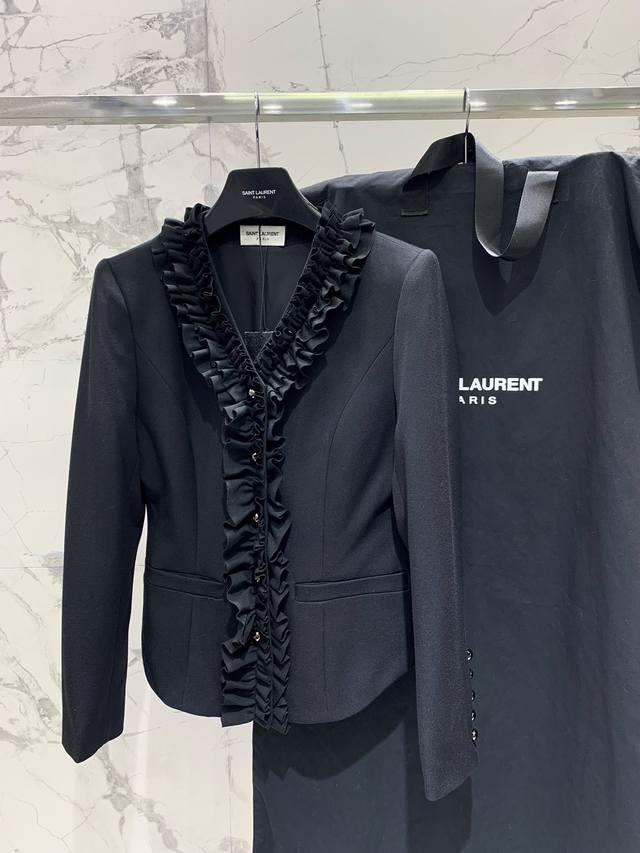 Saint Laurent's vintage lace suit The lotus leaf lace perfectly presents the el