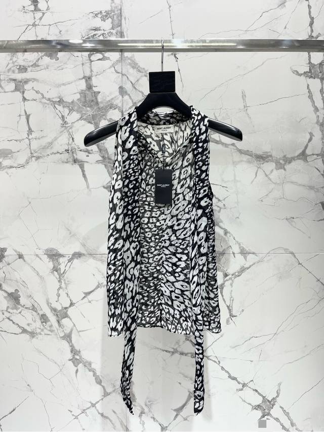 Saint Family's versatile halter neck lace-up sleeveless top The halter neck desi