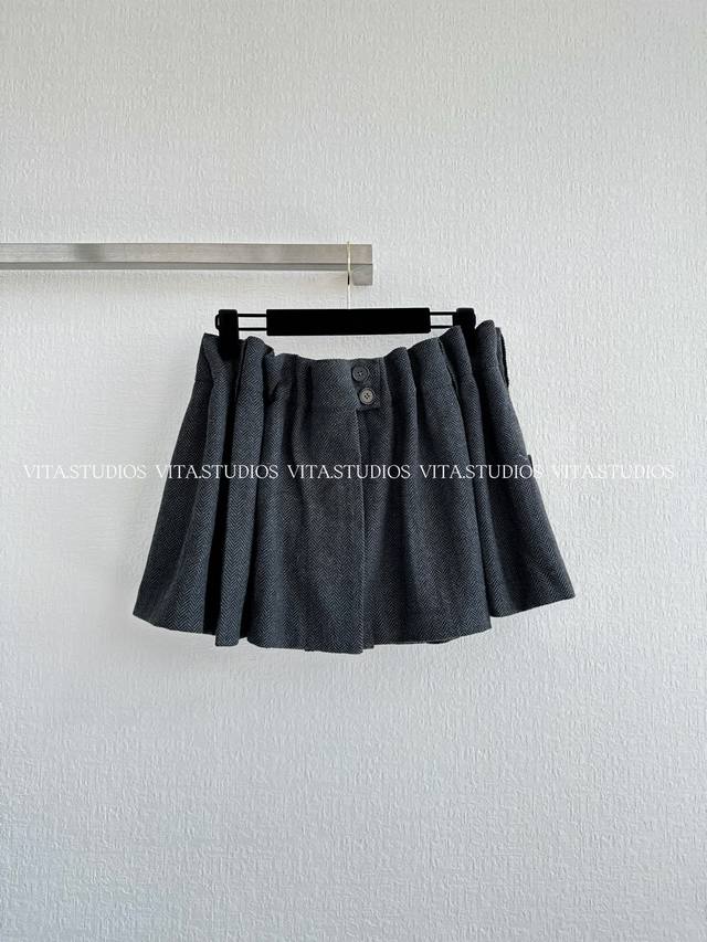 Hot-selling item in stock short skirt. Made from a warm wool blend, it's comfort