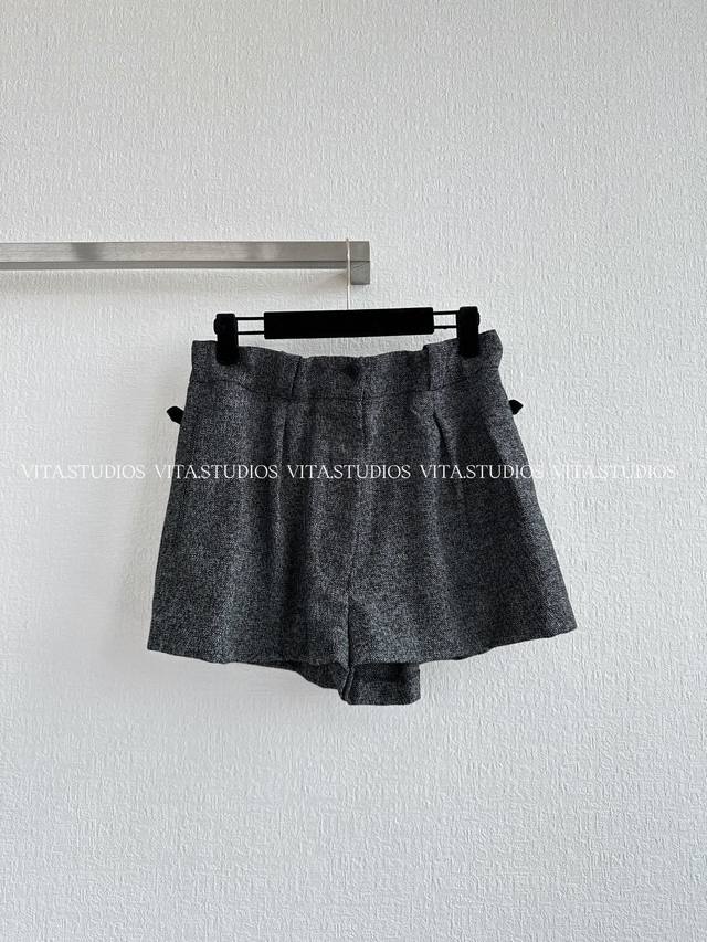 Hot item in stock waist shorts are made of wool blend material with a crisp text