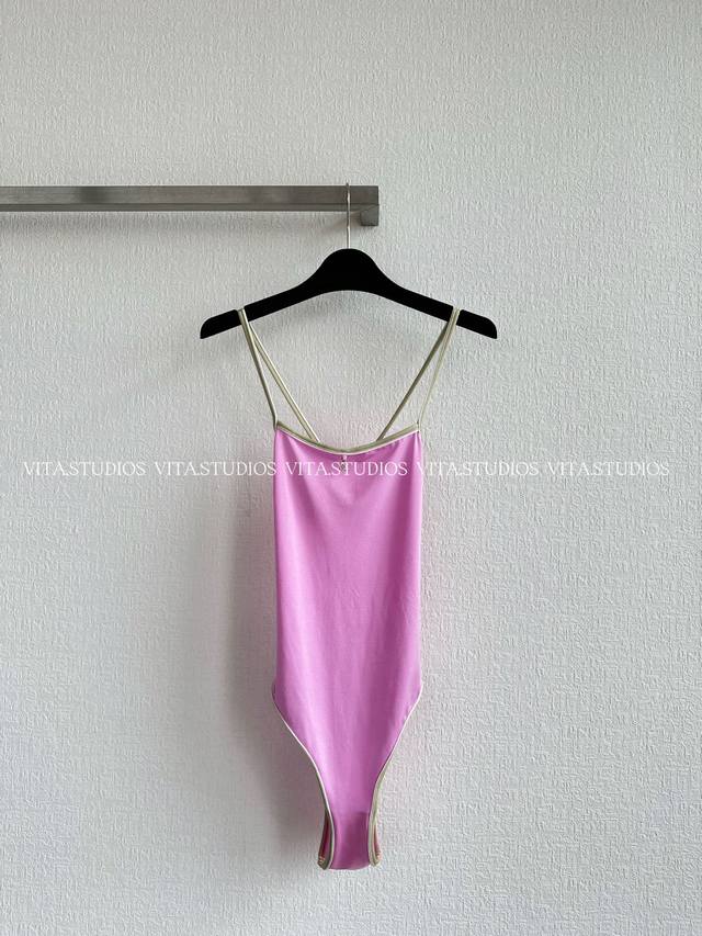 Hot-selling item in stock: Backless Cross Strap Triangle One-Piece Swimsuit. Mad